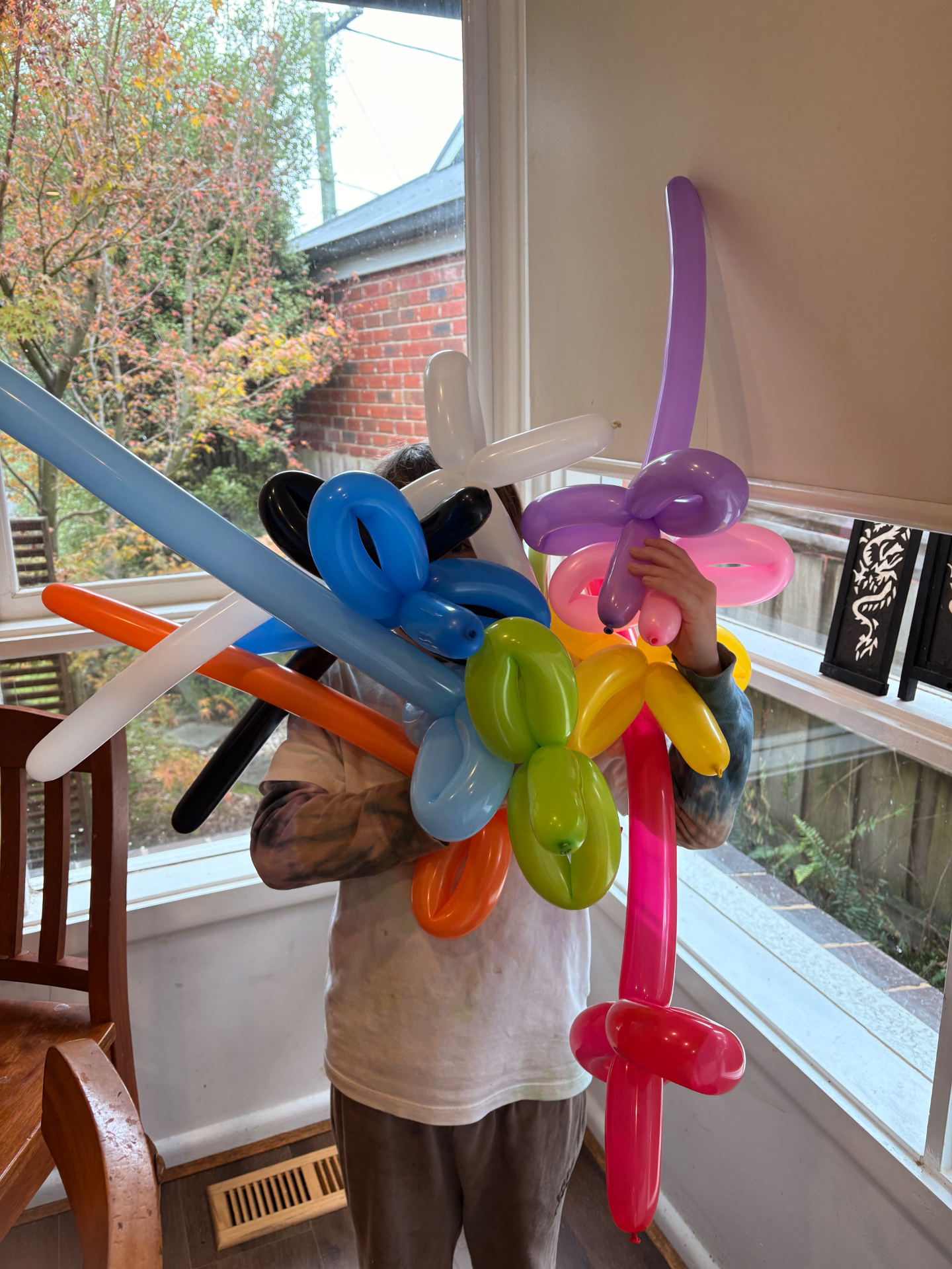 A big rainbow bouquet of twisted balloons